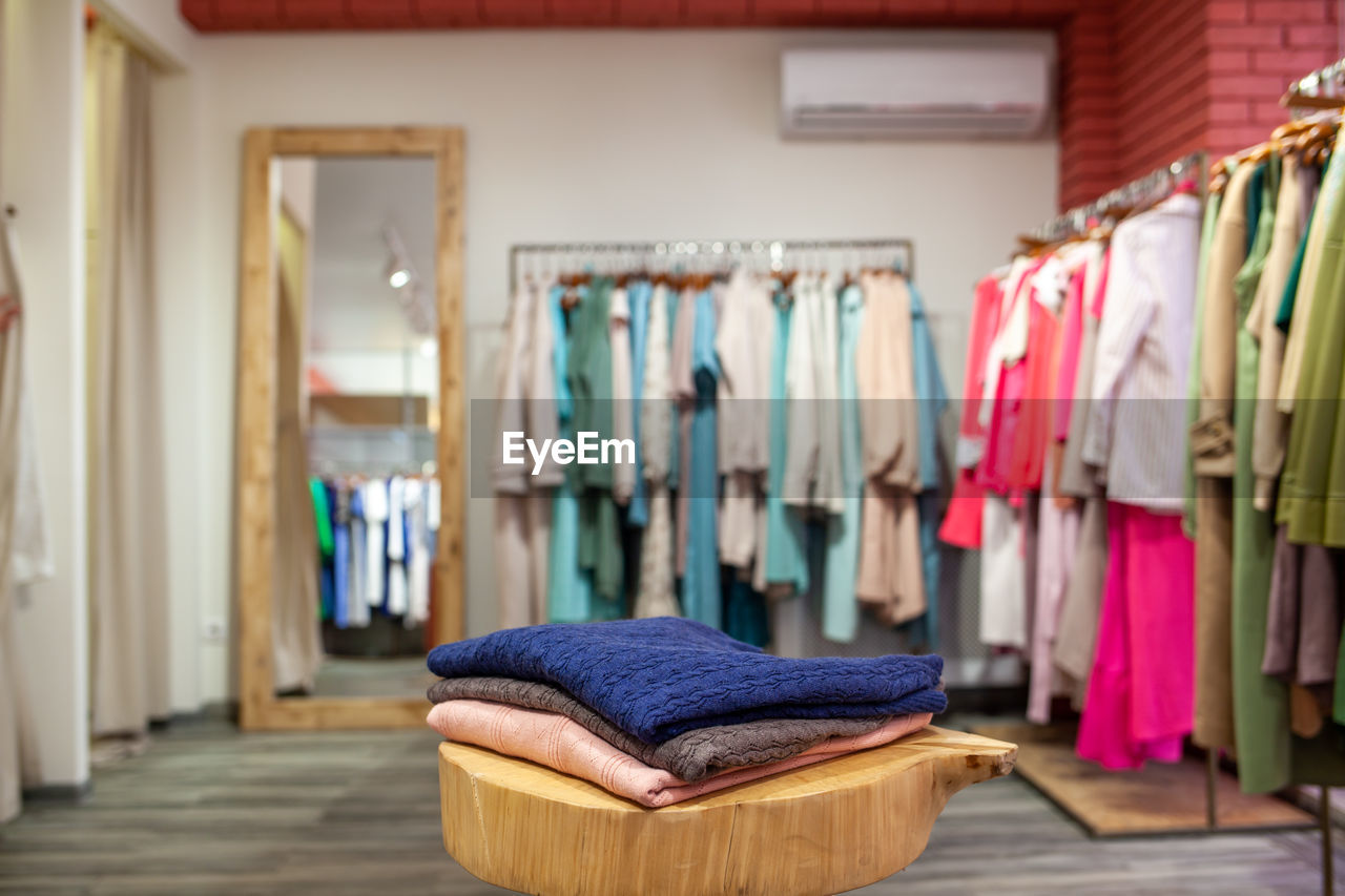 clothes hanging on tiled floor