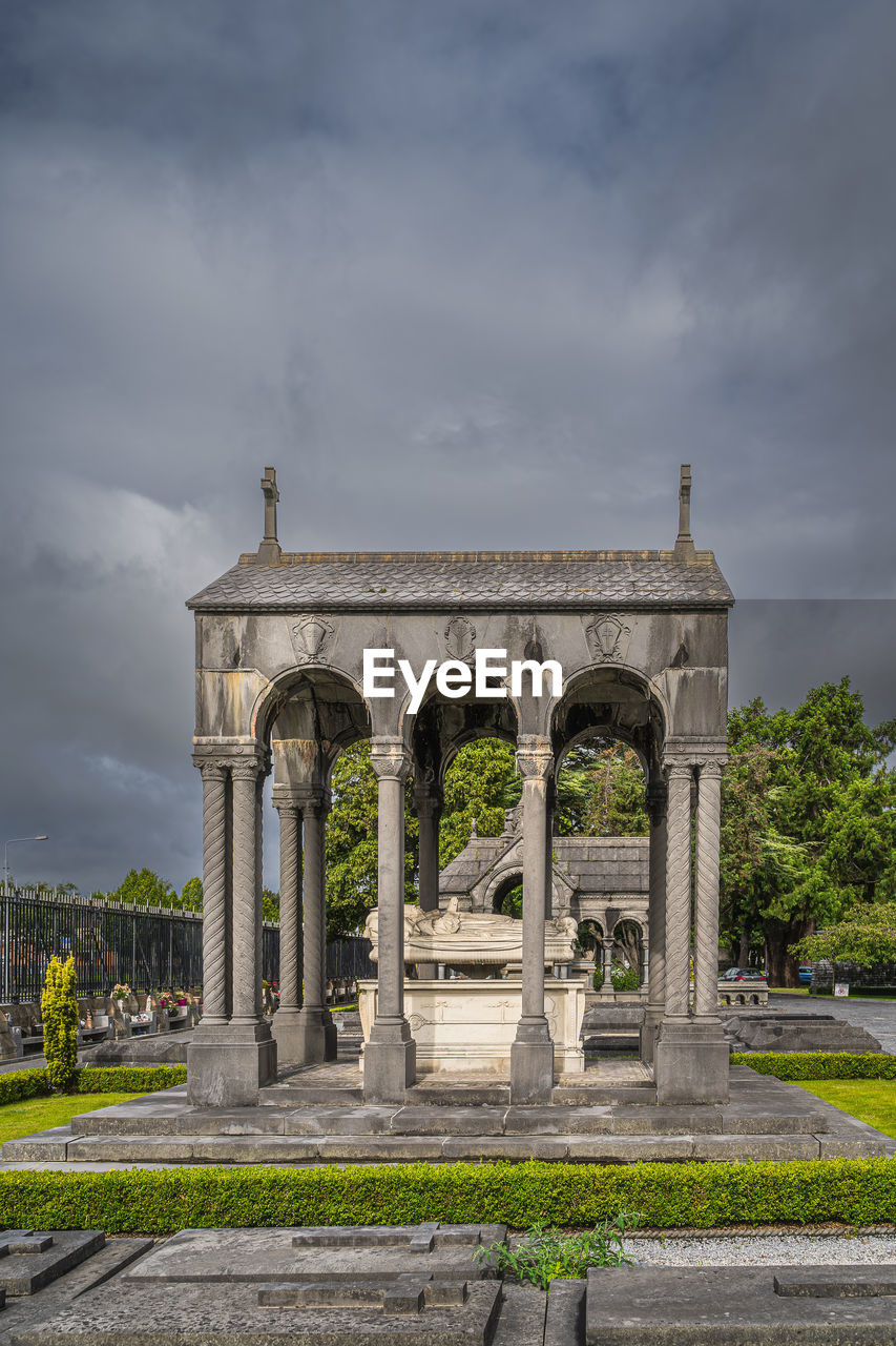 architecture, landmark, cloud, built structure, sky, history, the past, travel destinations, nature, architectural column, monument, building exterior, city, travel, memorial, arch, plant, tourism, no people, outdoors, day, religion, overcast, ancient history, ancient, ruins, street