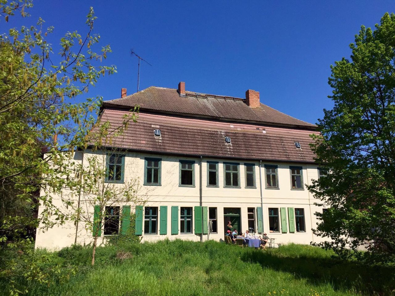 HOUSES AGAINST CLEAR SKY