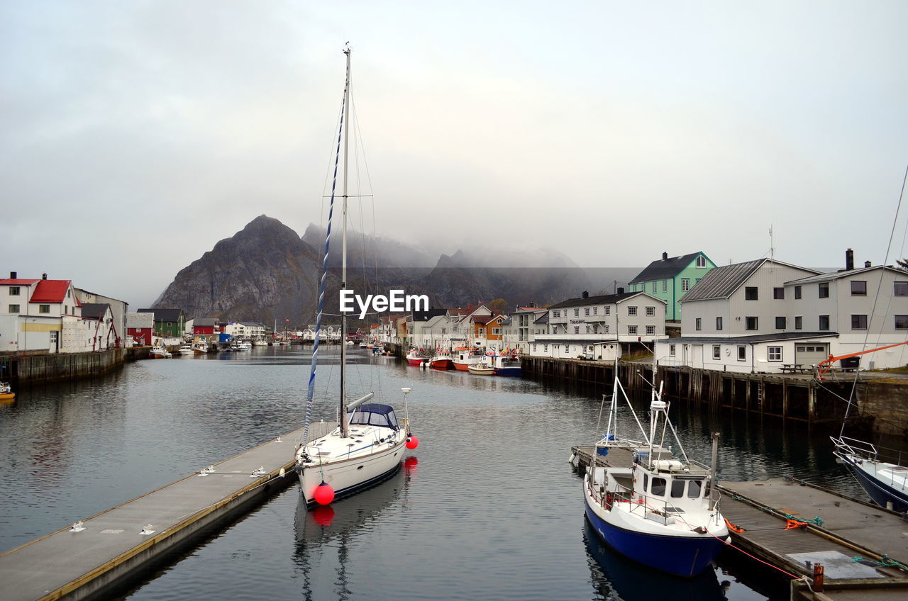 Marvelous small silent harbor in northern norway in a cloudy day