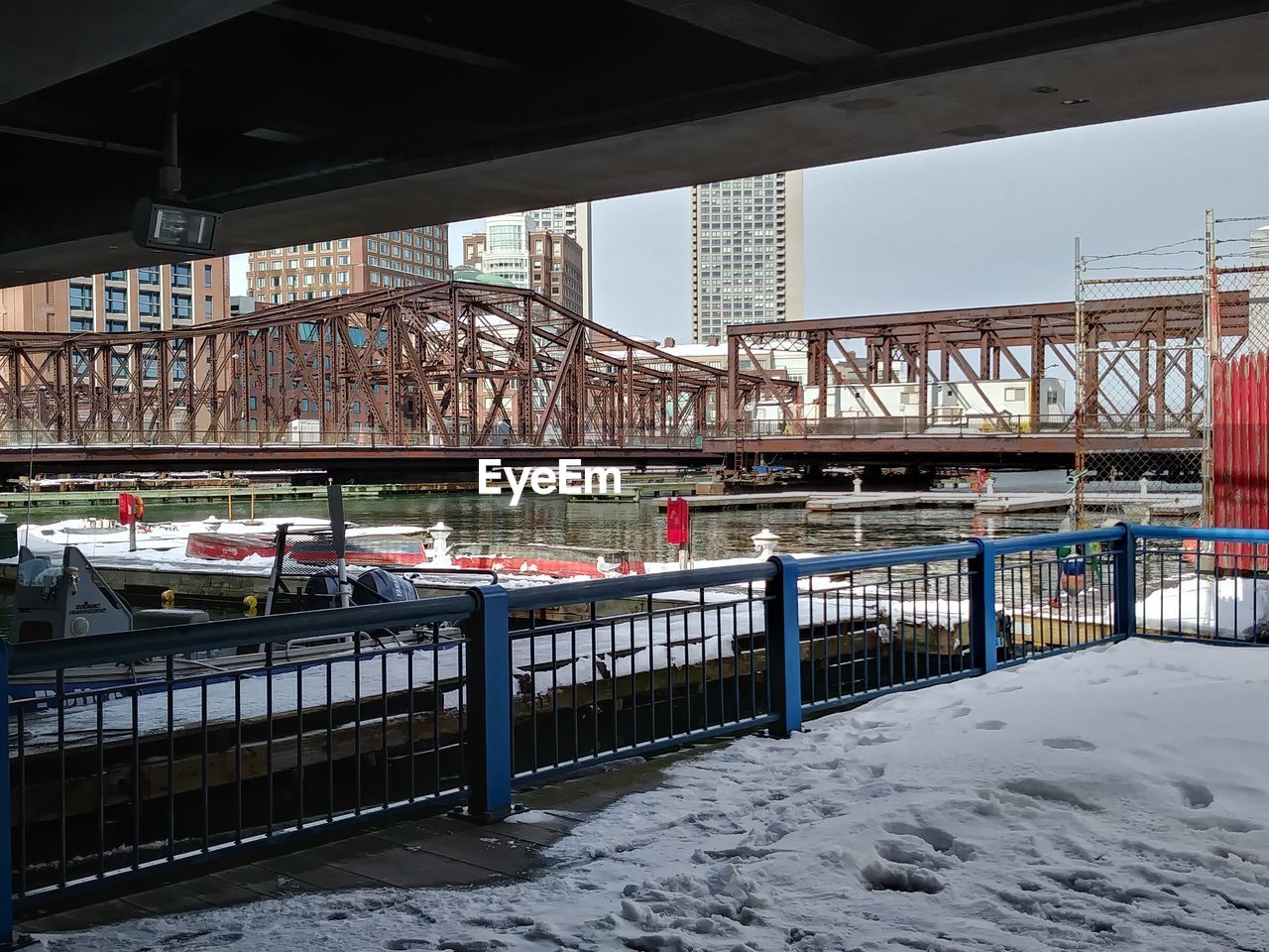 BRIDGE IN CITY AGAINST SKY