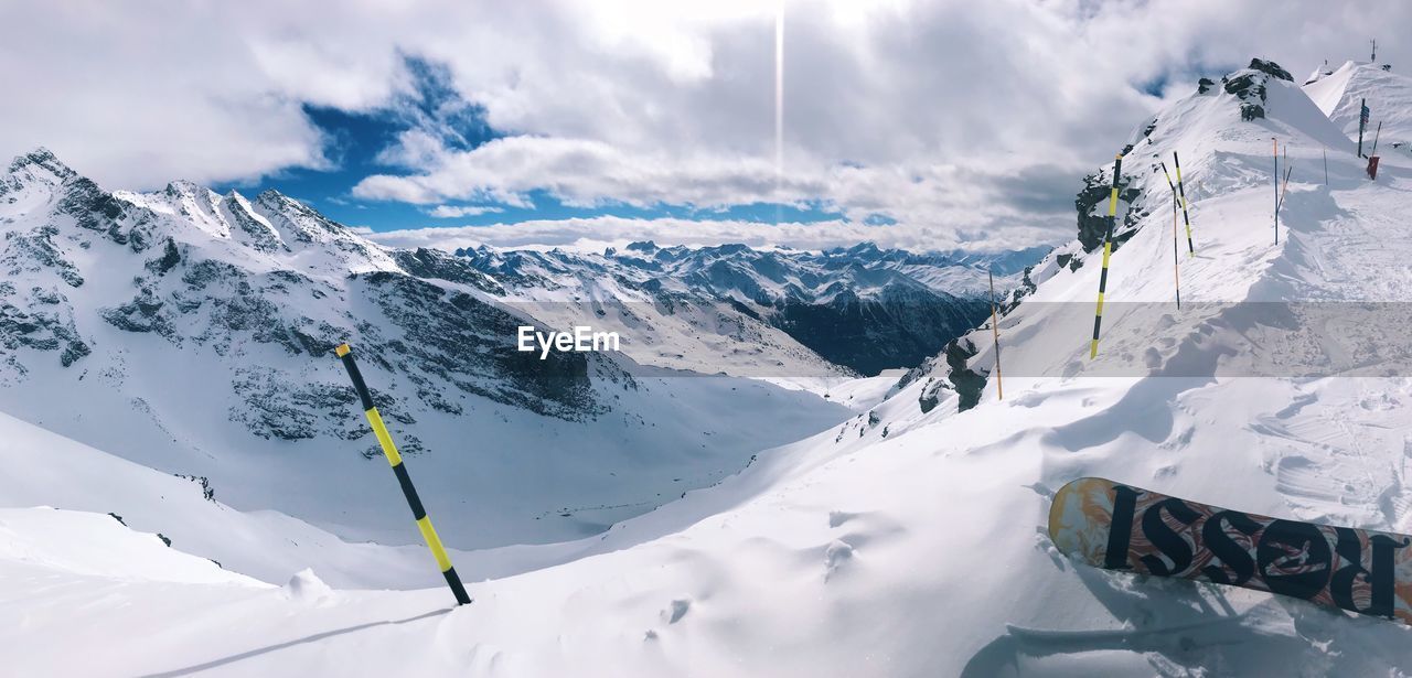 Panoramic view of snowcapped mountain against sky