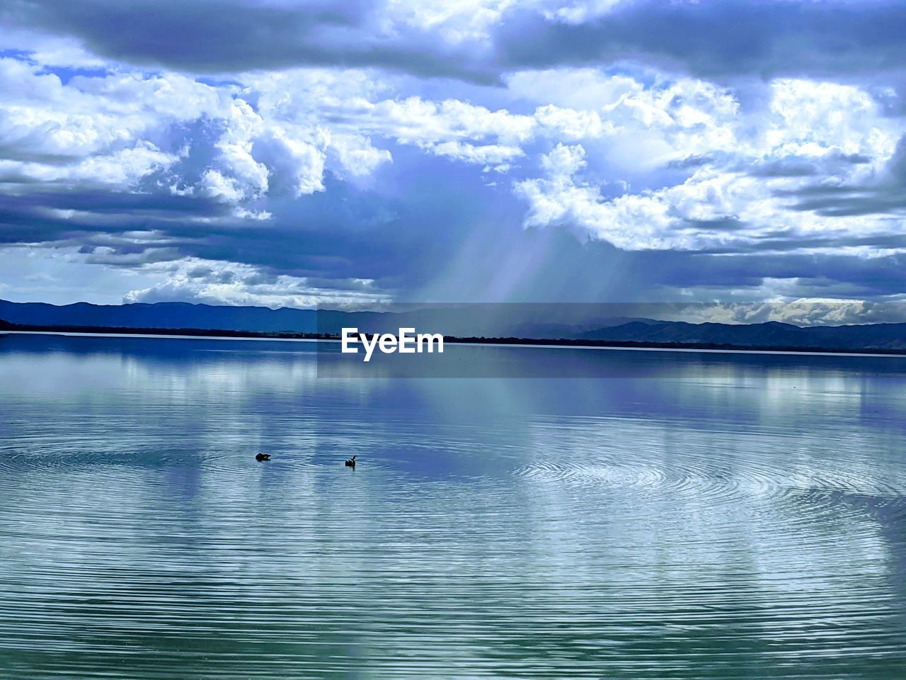 VIEW OF LAKE AGAINST SKY