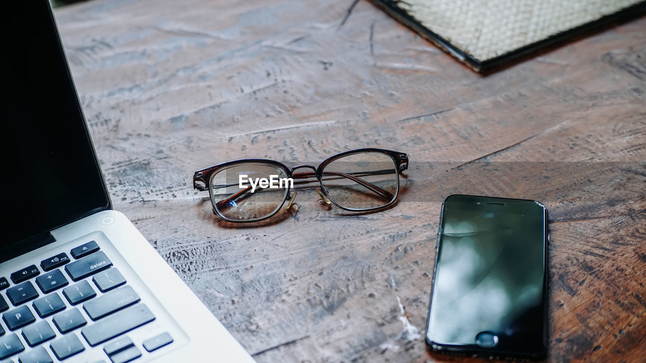 High angle view of eyeglasses on table