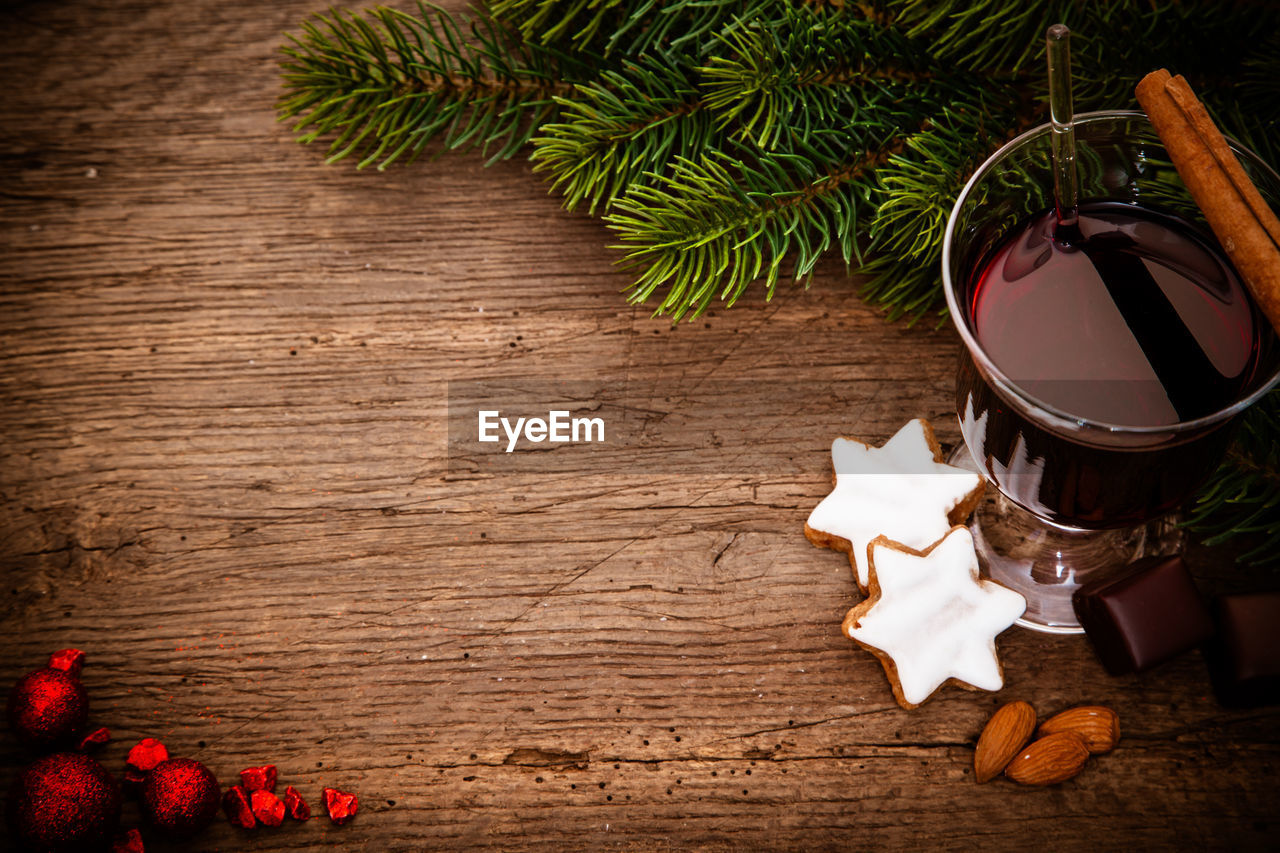 High angle view of mulled wine and food on table