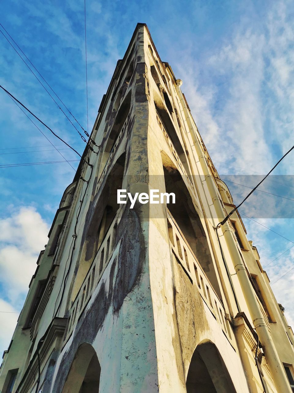 Low angle view of old building against sky