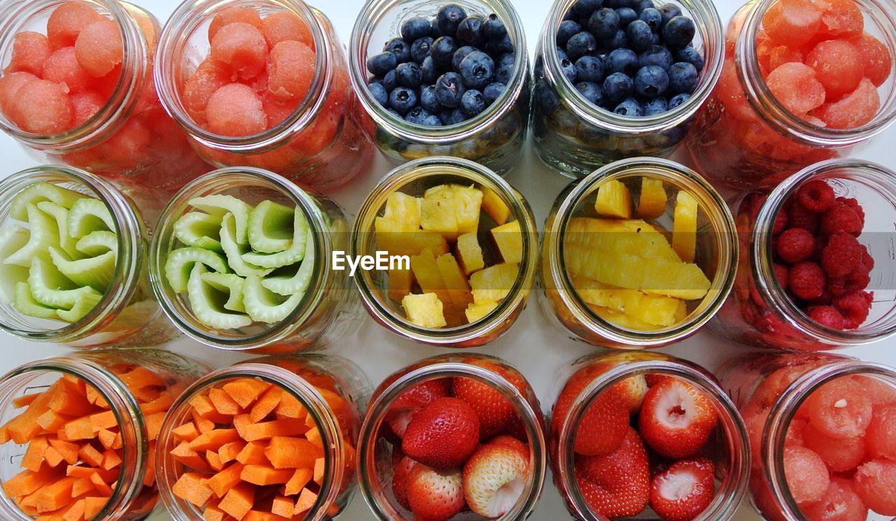 Close-up of fruits in jars