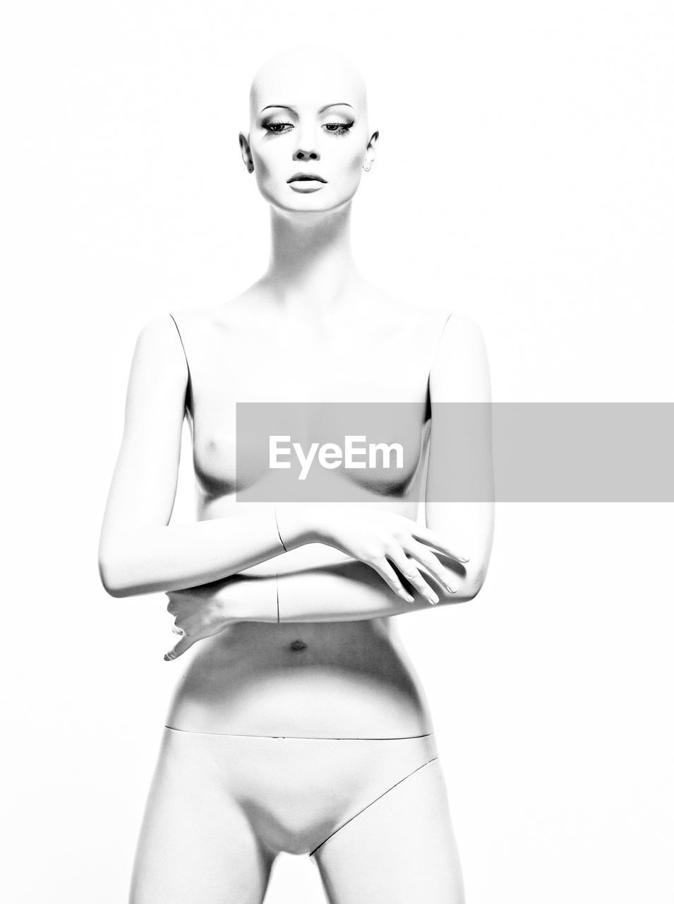 Naked mannequin against white background