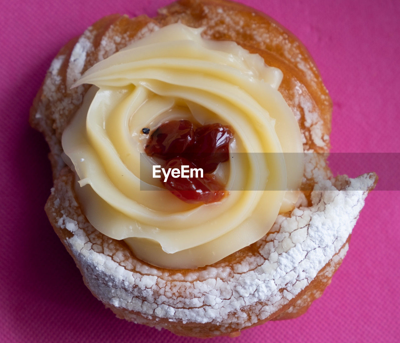 food and drink, food, dessert, sweet food, sweet, freshness, icing, indoors, produce, no people, dish, close-up, studio shot, cuisine, sweetness, baked, colored background, cream, still life, cake, cupcake, directly above, pink, temptation, plate, high angle view