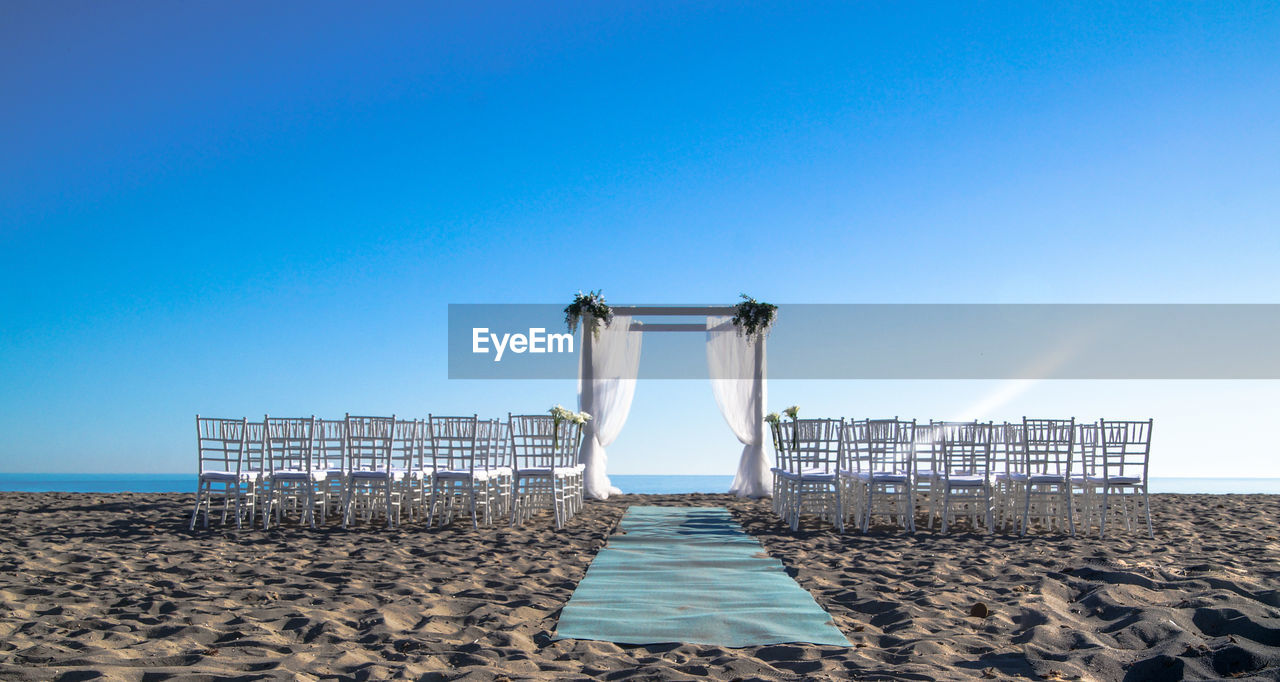 Chairs for wedding ceremony on beach