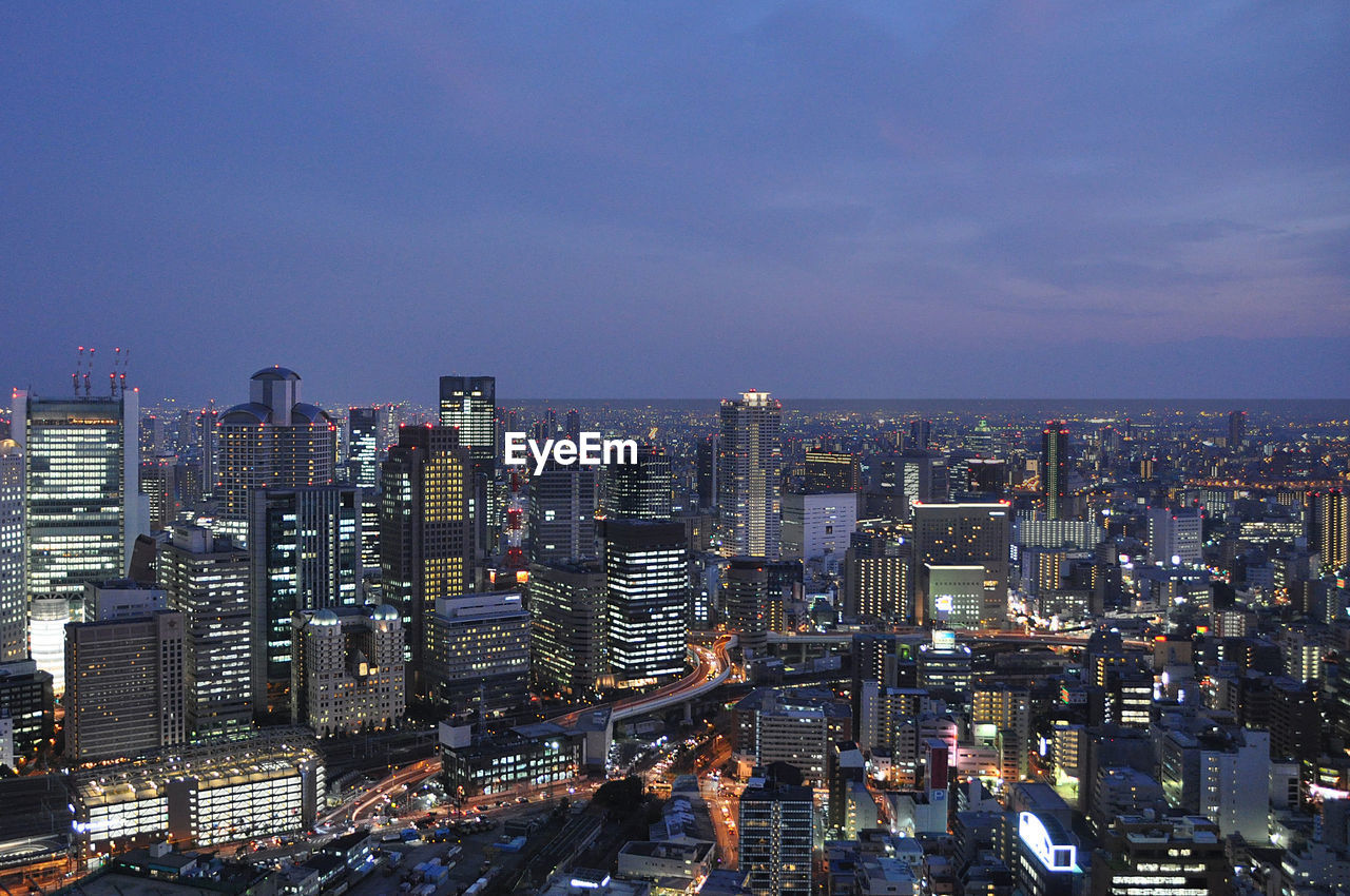 Illuminated cityscape at night