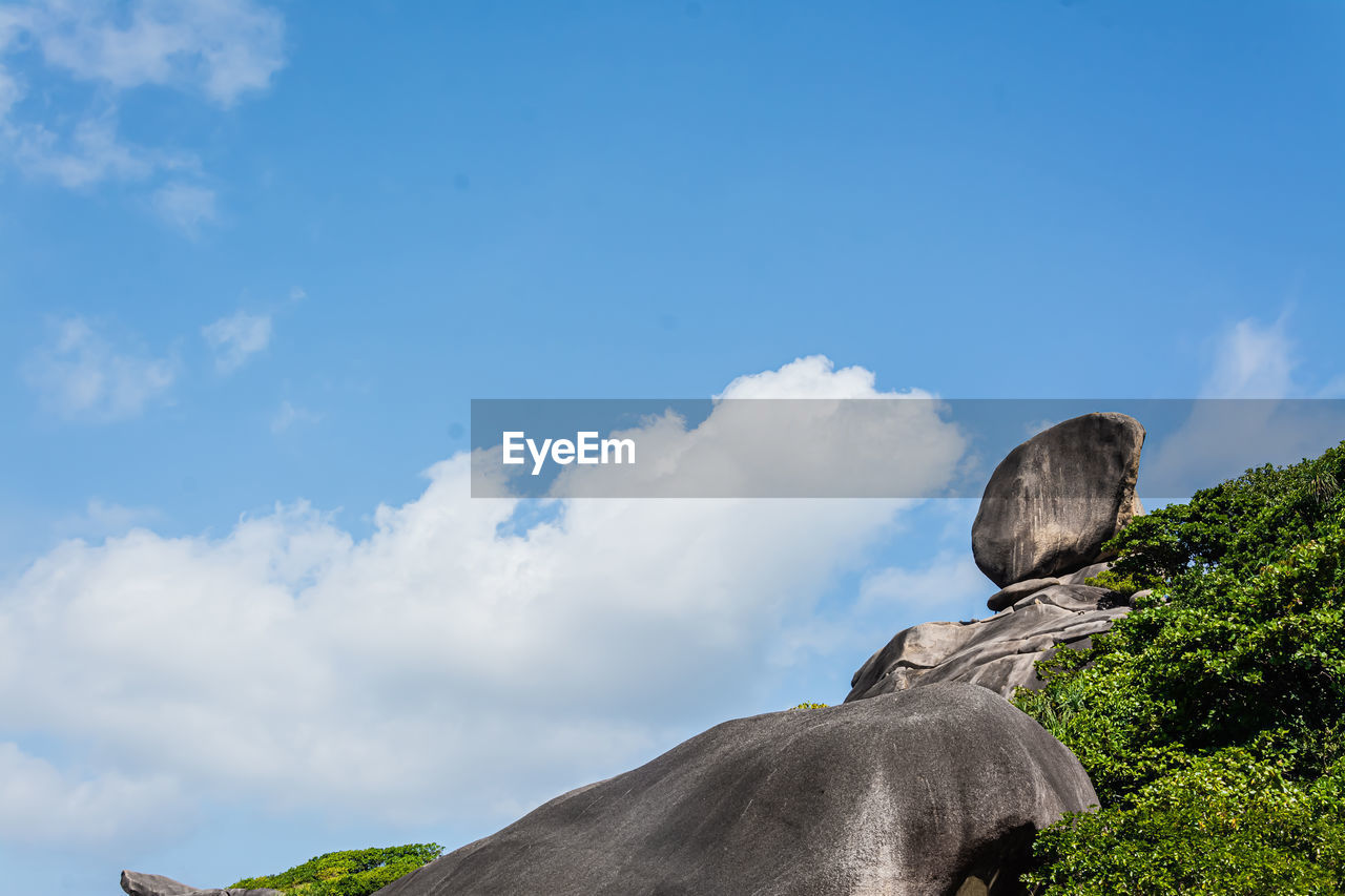 sky, rock, cloud, mountain, nature, blue, sea, no people, mountain range, environment, tree, scenics - nature, landscape, beauty in nature, travel destinations, travel, outdoors, day, animal wildlife, adventure, plant, statue, land, copy space, wilderness, monument, terrain, animal, animal themes, tranquility, non-urban scene, tourism, horizon, geology