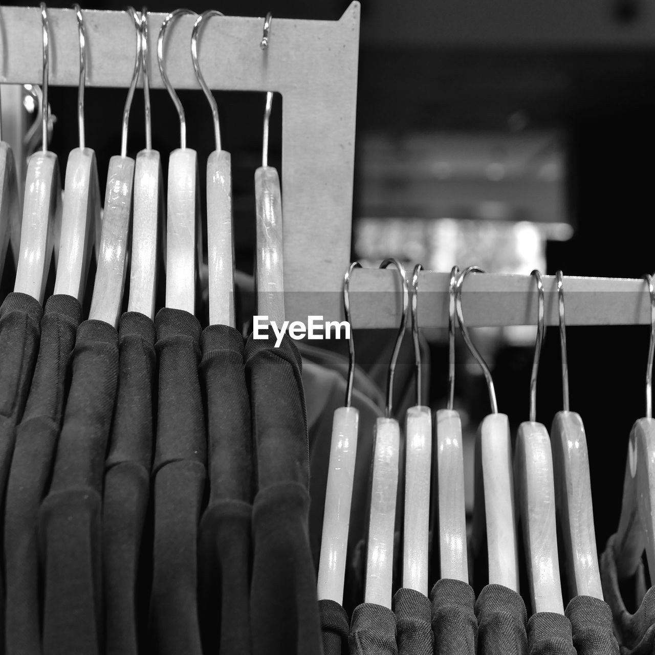 Close-up of objects in rack at store