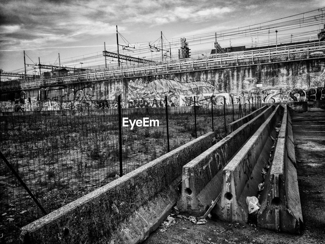 RAILROAD TRACKS AGAINST BRIDGE