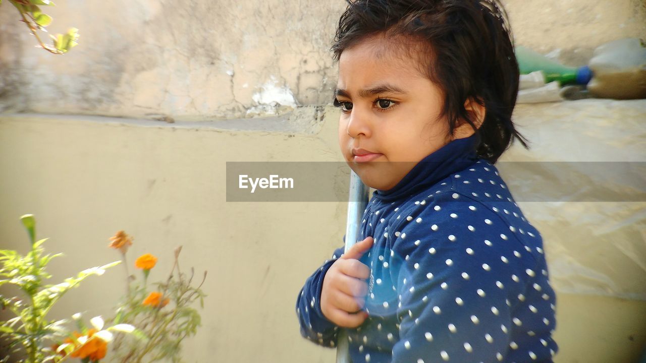 Close-up of girl looking away