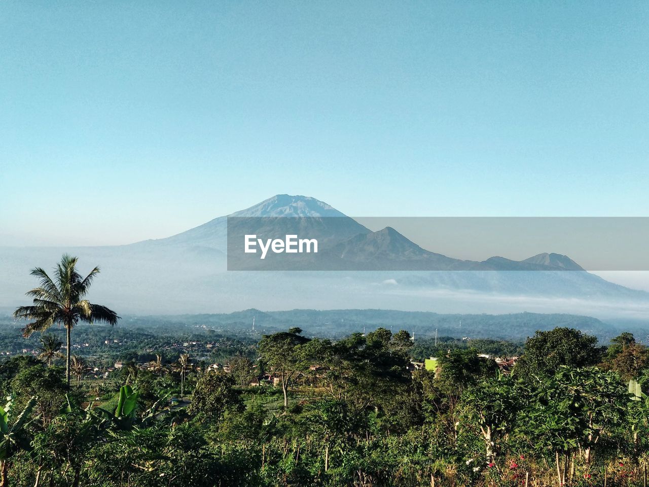 Early morning scenic view of mountains against clear sky in indonesia