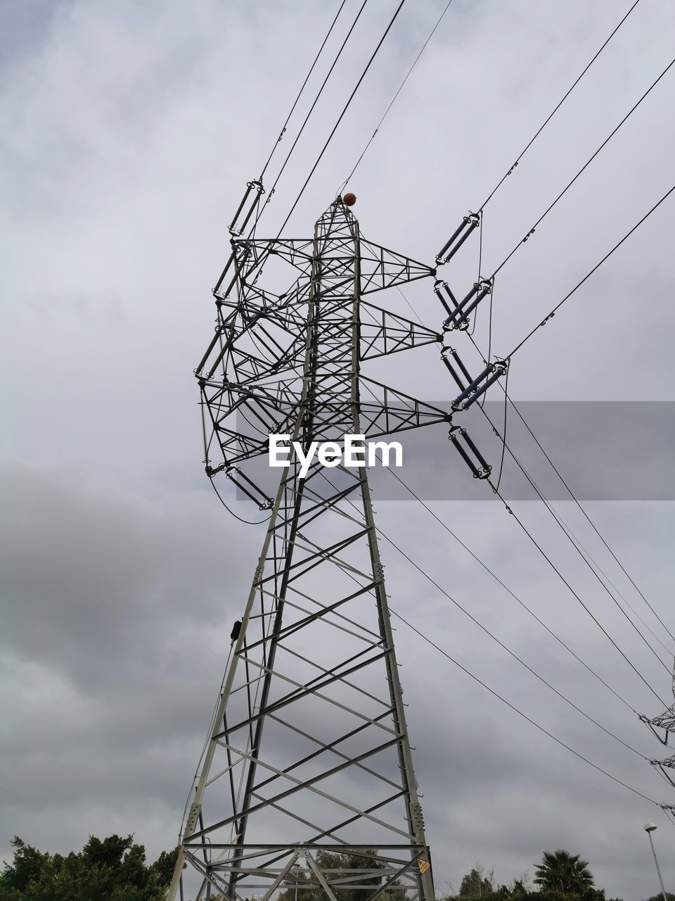 LOW ANGLE VIEW OF ELECTRICITY PYLON