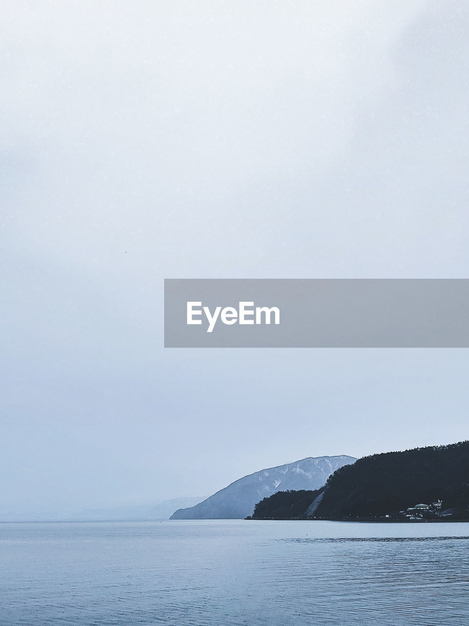 Scenic view of lake against clear sky