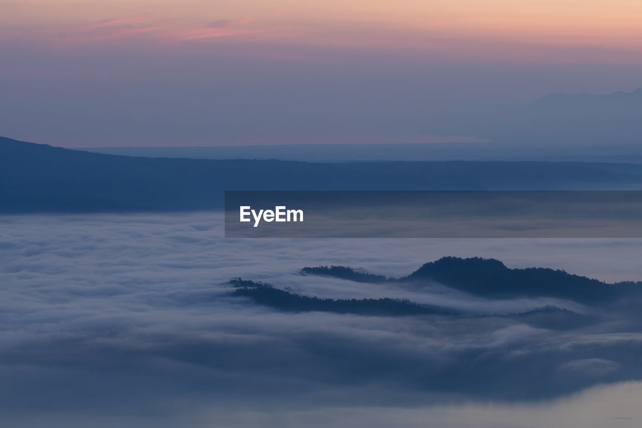 Scenic view of dramatic sky during sunset