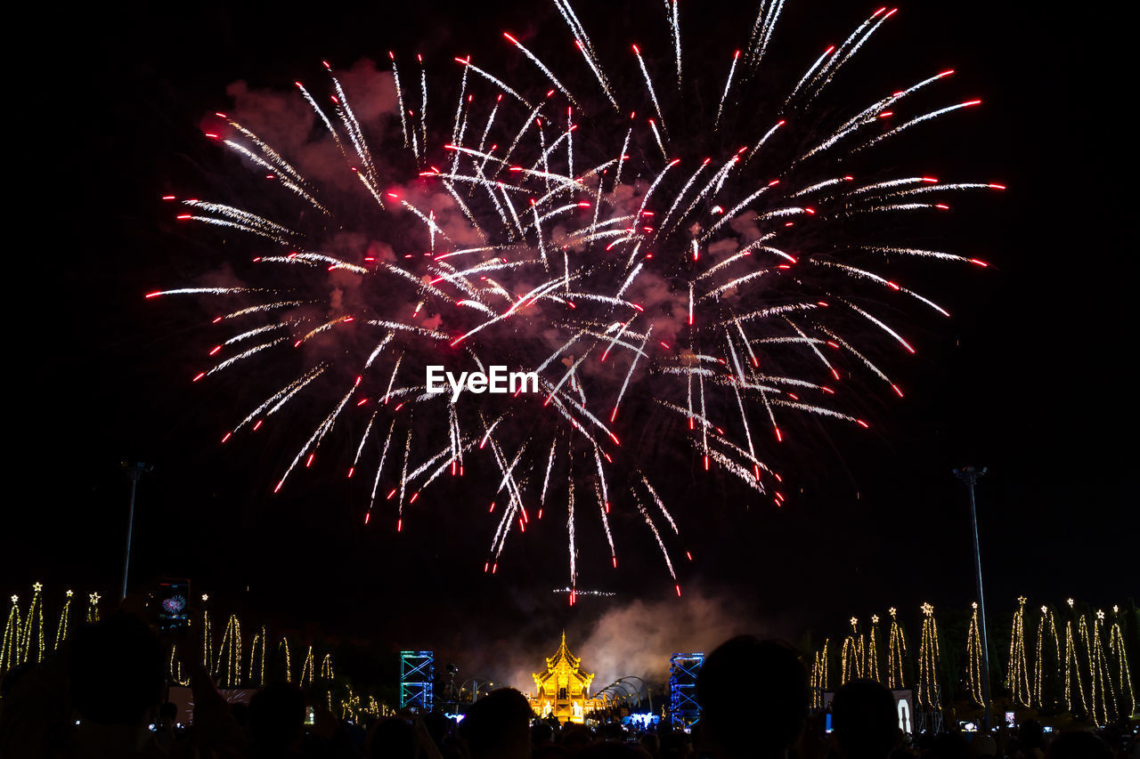 Low angle view of sky illumed with fire crackers