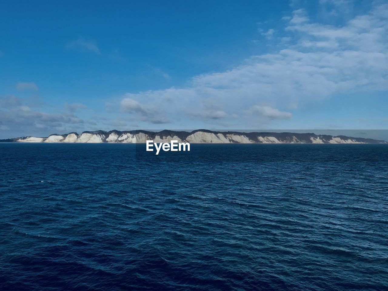 SCENIC VIEW OF BLUE SEA AGAINST SKY