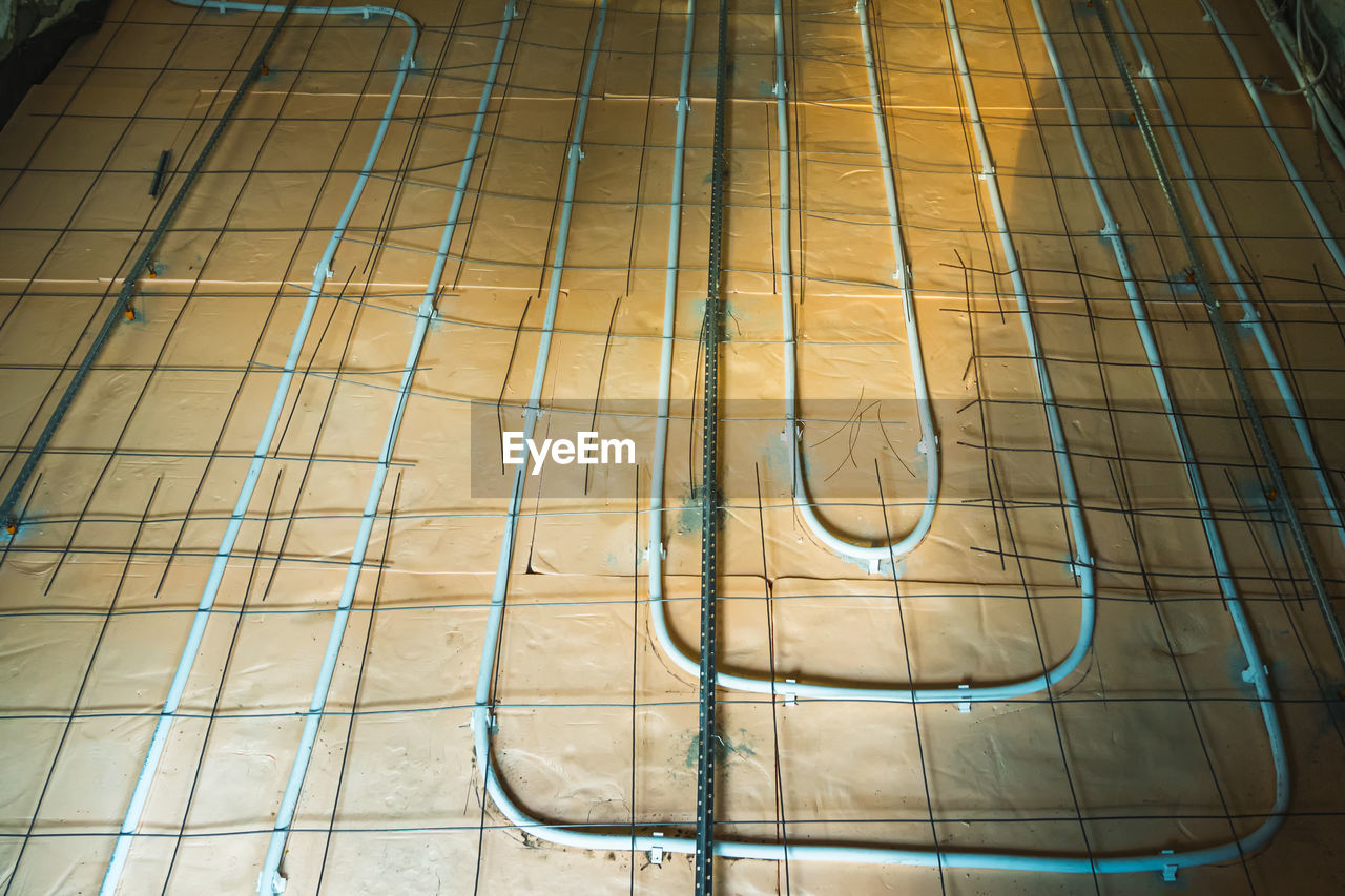 floor, no people, flooring, line, high angle view, metal, glass, pattern, indoors, wood, architecture, day