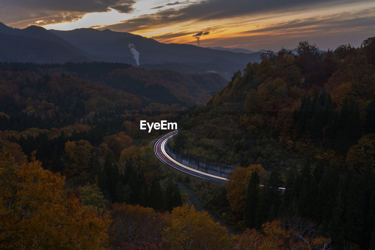 Scenic view of mountains against sky during sunset