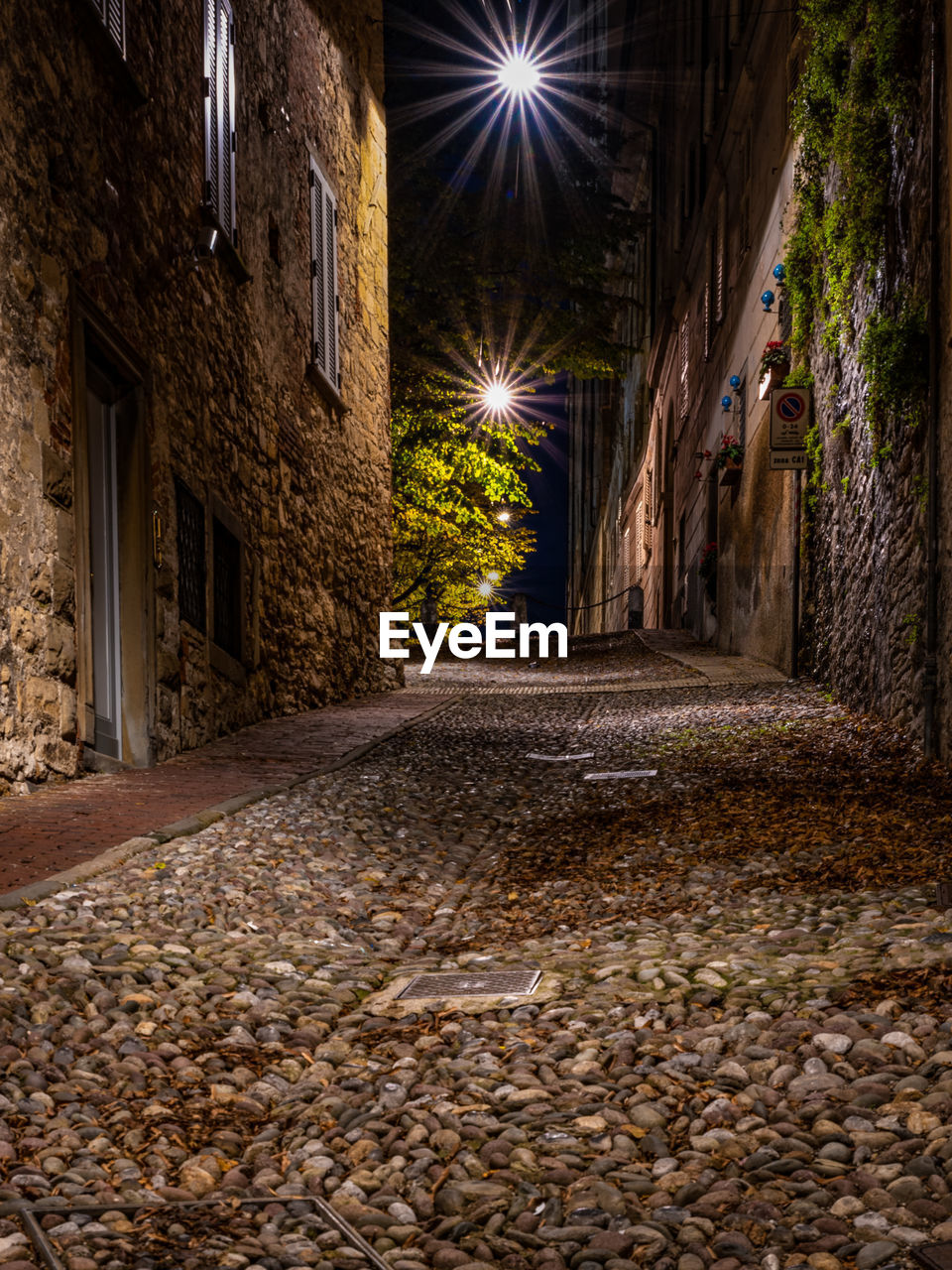 STREET AMIDST BUILDINGS IN CITY