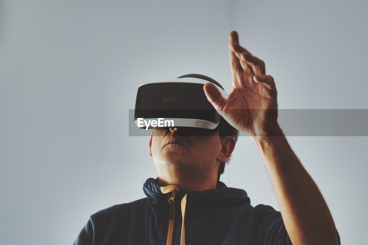 Portrait of man using virtual reality