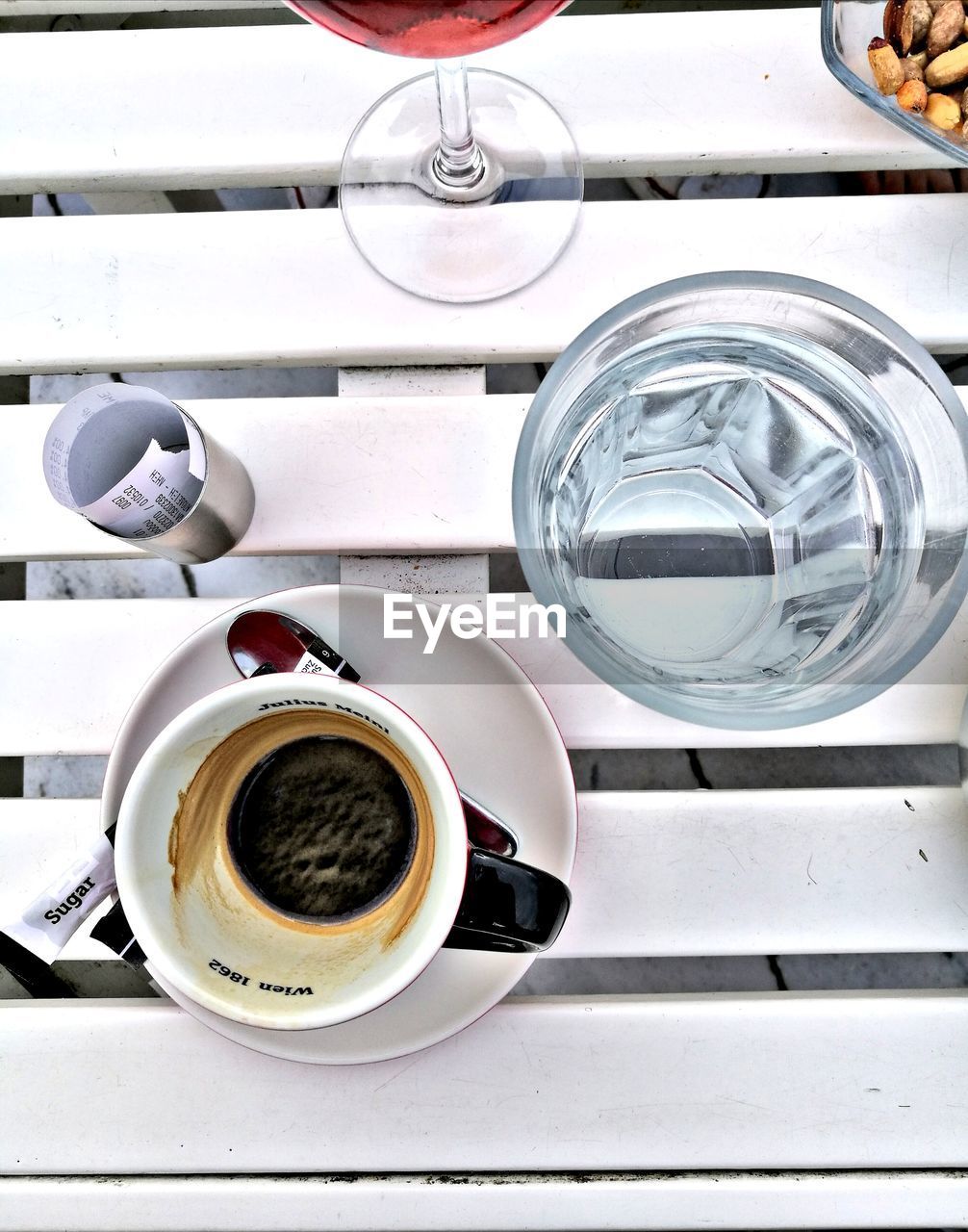 CLOSE-UP OF COFFEE WITH CUP OF CUPS