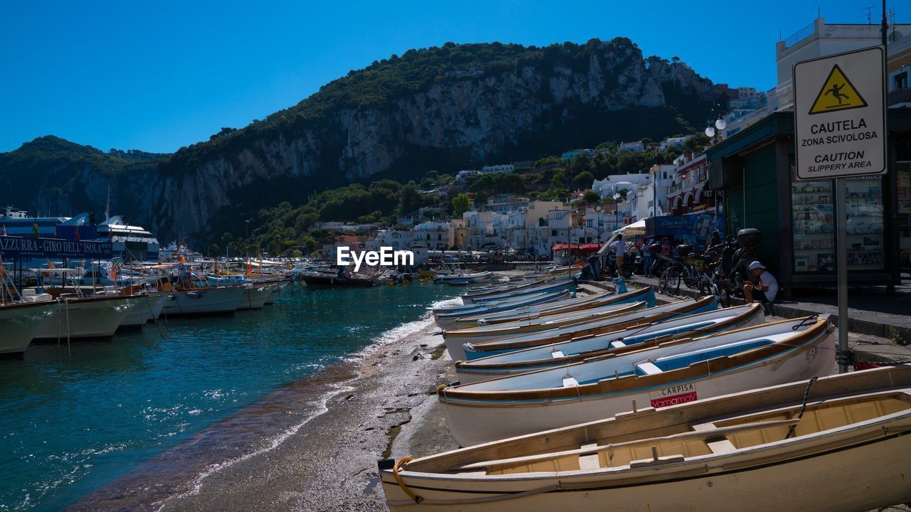 Boats moored in sea