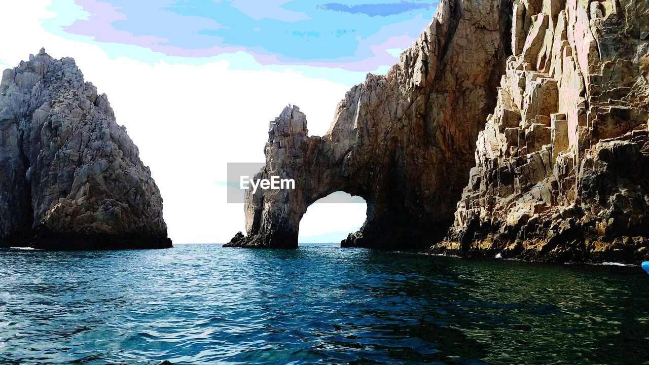 PANORAMIC VIEW OF SEA AND CLIFF