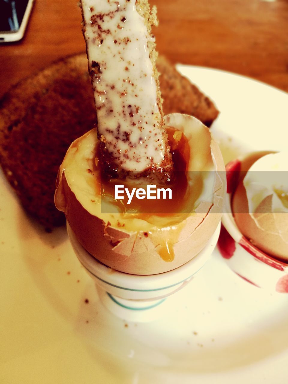 CLOSE-UP OF SERVED CAKE WITH ICE CREAM