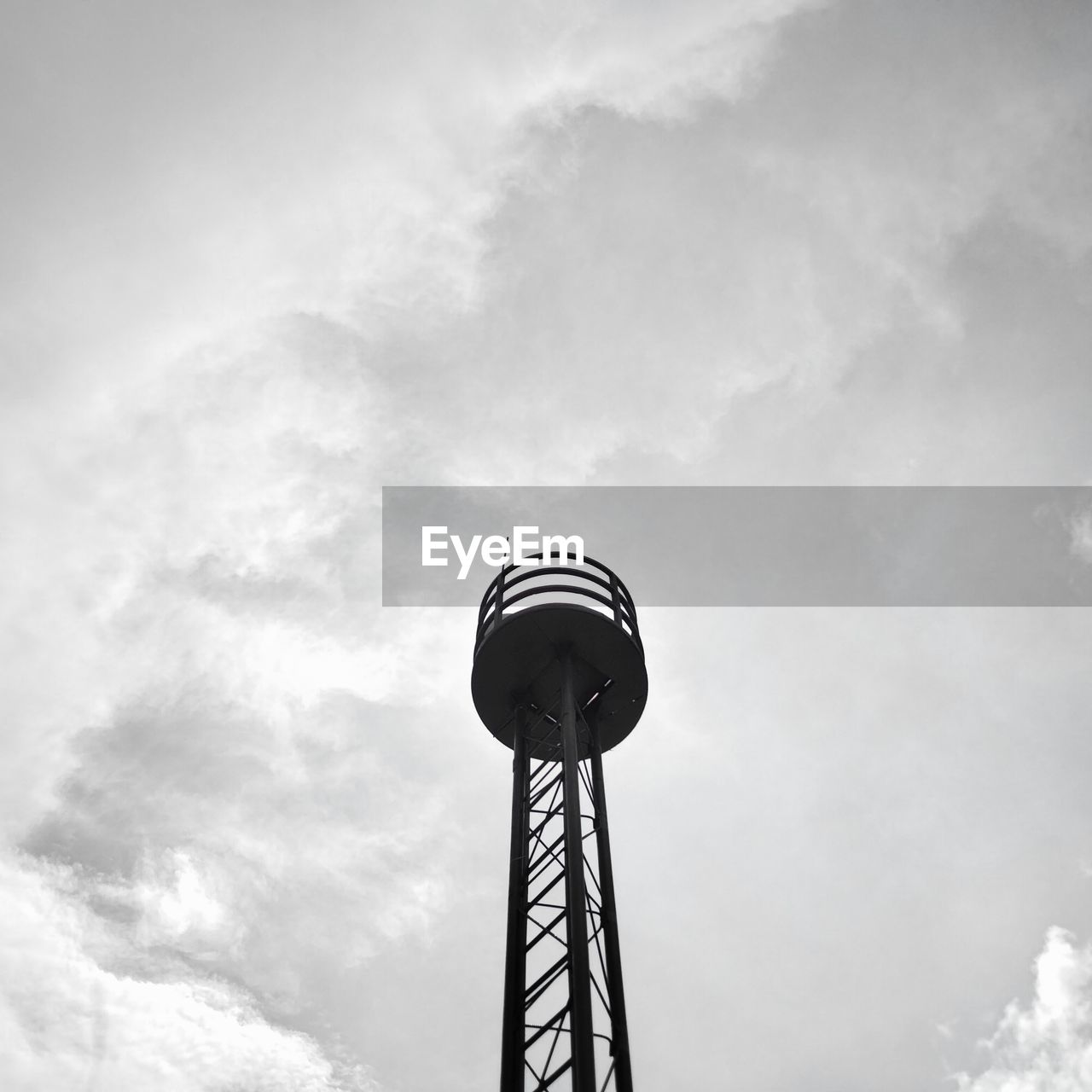 sky, cloud, low angle view, white, black and white, architecture, nature, tower, built structure, monochrome photography, no people, outdoors, monochrome, communications tower, communication, day, light, water tower, street light, technology, lighting