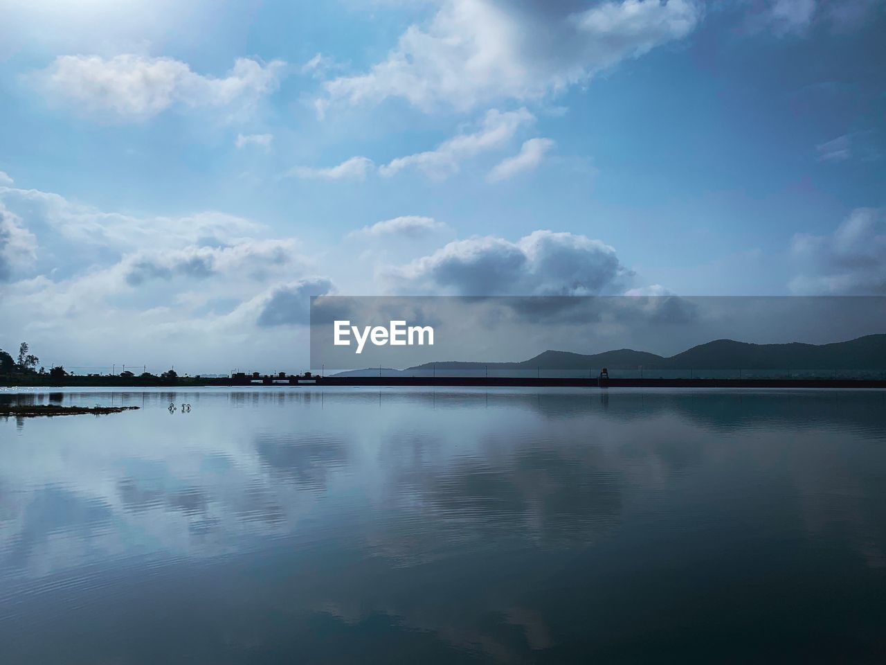 Scenic view of lake against sky