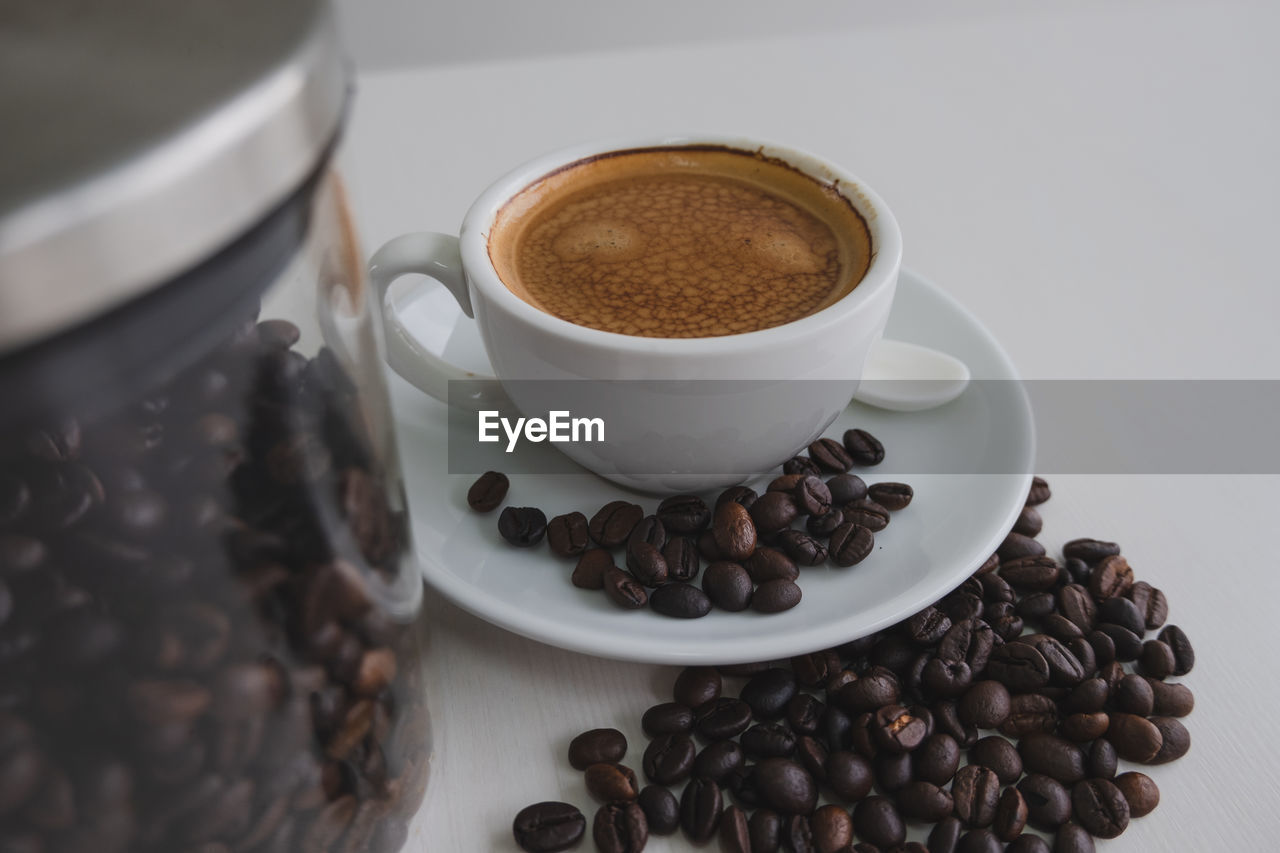 HIGH ANGLE VIEW OF COFFEE CUP AND CAKE