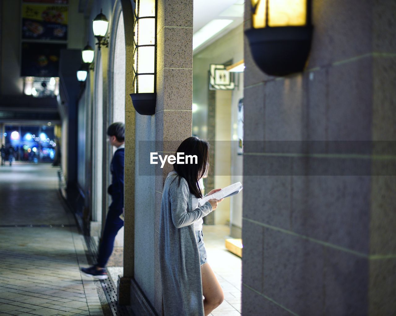 Woman standing in city