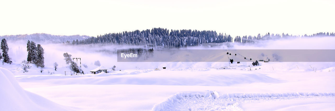 Panoramic view of snow covered land against sky, gulmarg kashmir 