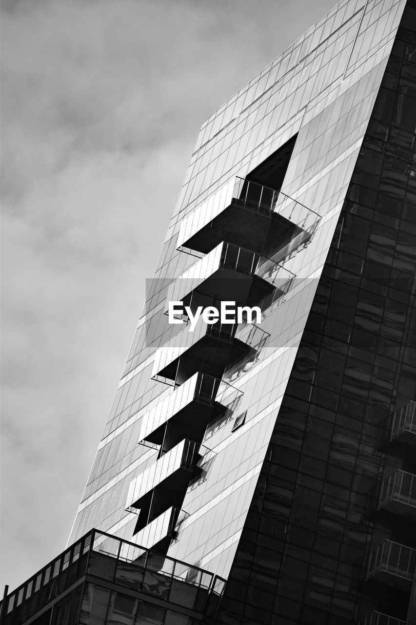 Low angle view of modern building against sky