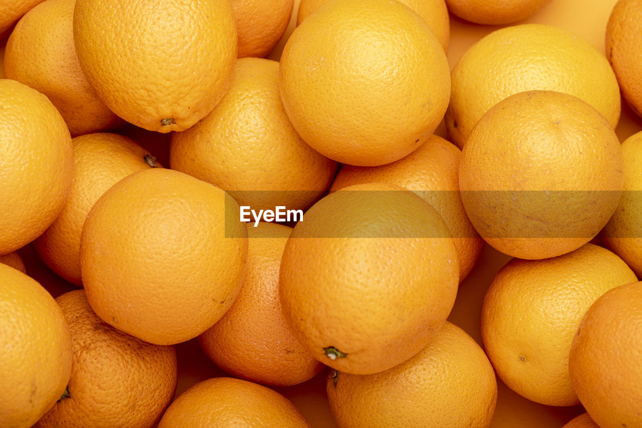 A bunch of orange fruits