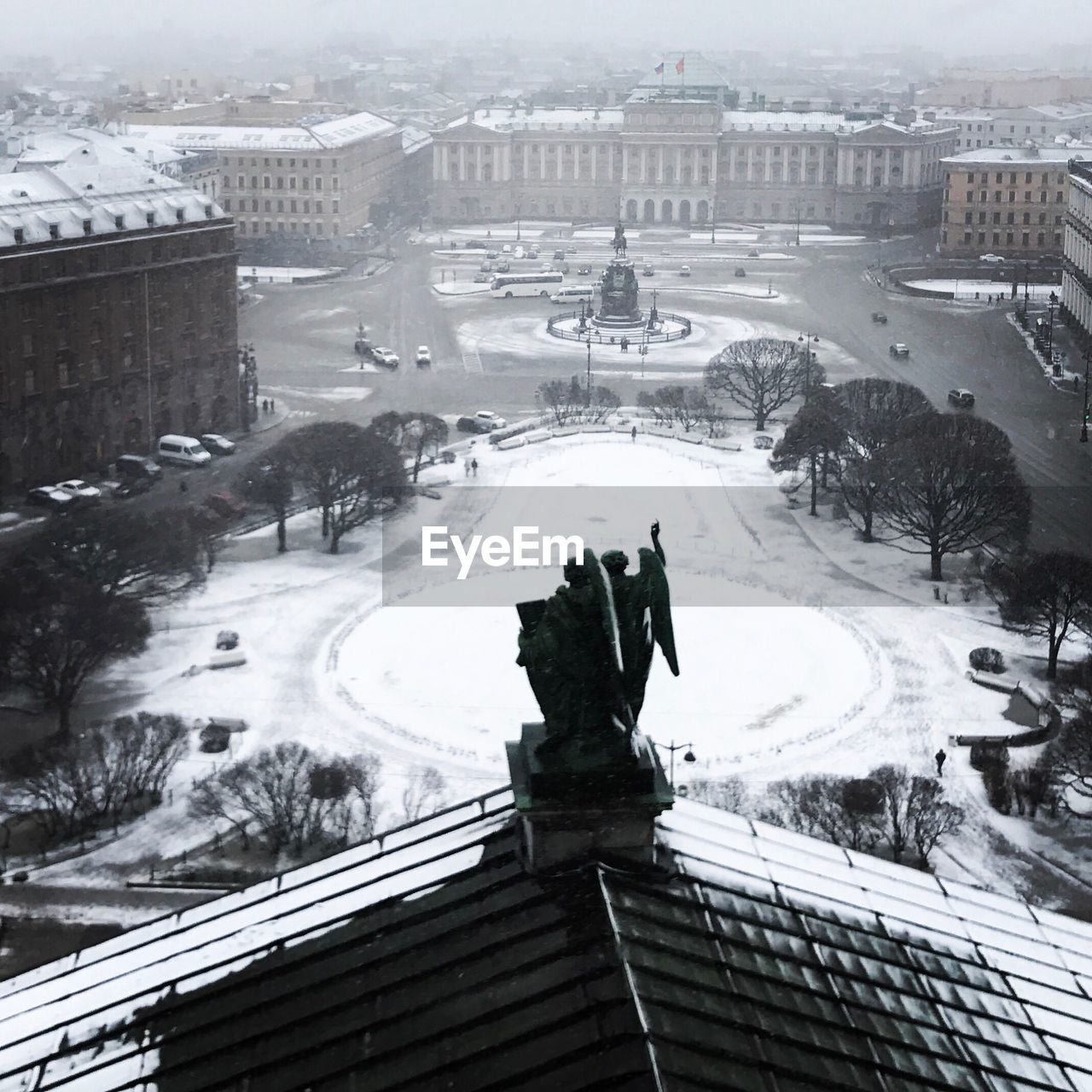 HIGH ANGLE VIEW OF SNOW ON CITYSCAPE DURING WINTER