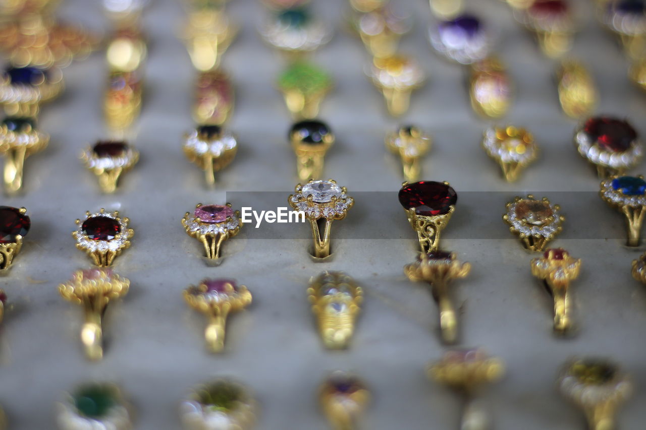 High angle view of jewelry decorations on table