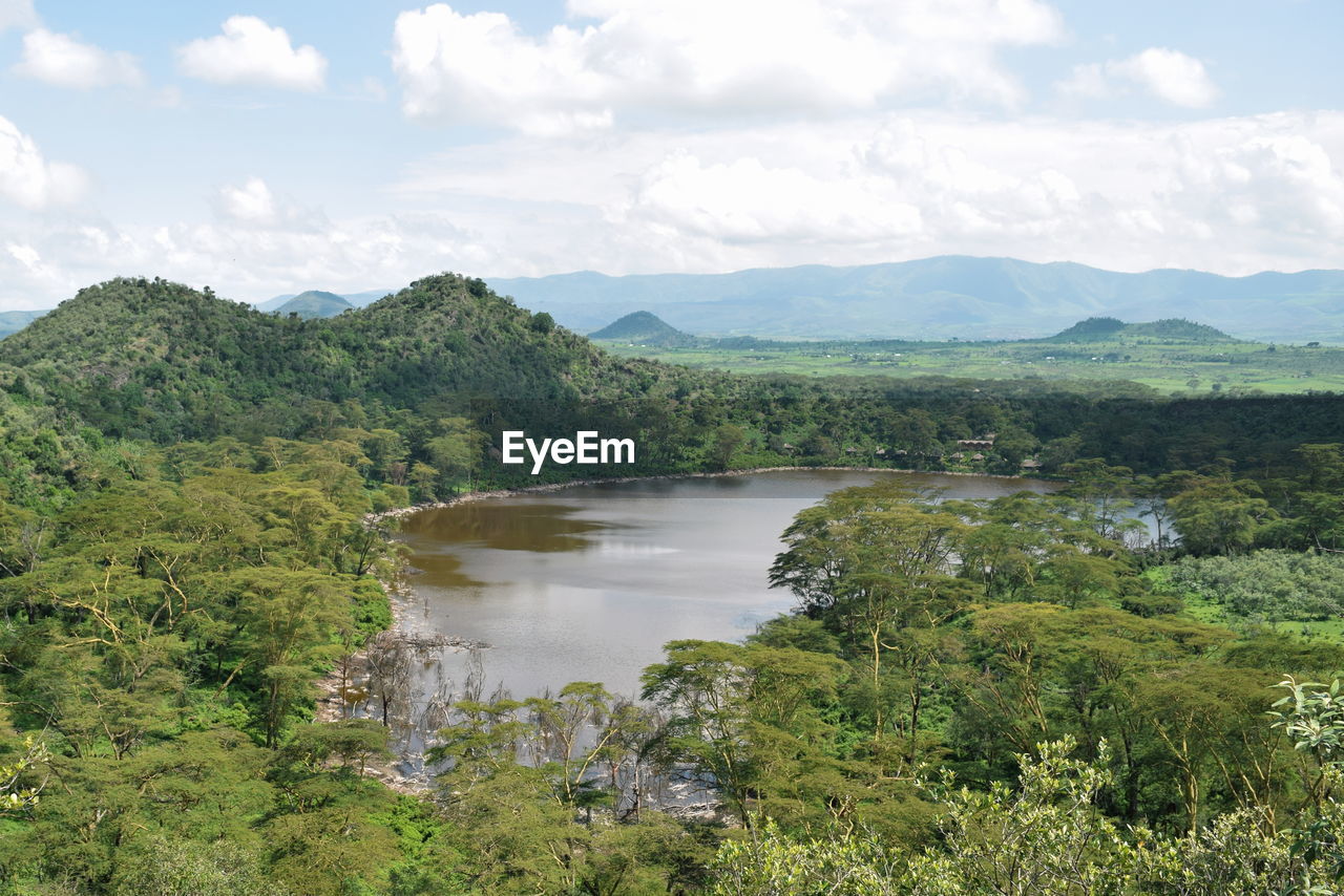 Crater lake against a panoramic mountain landscapes of naivasha, rift valley, kenya