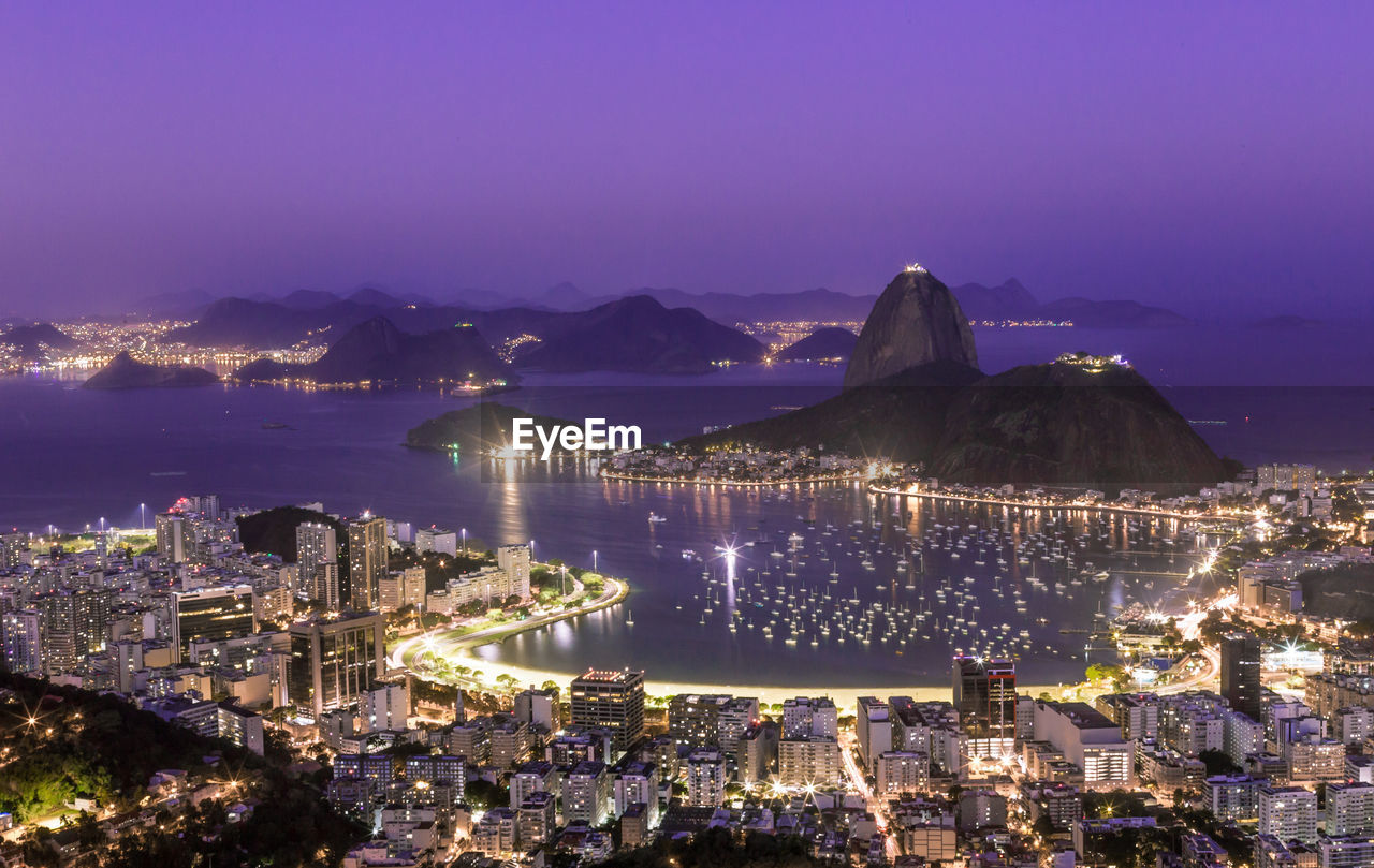 High angle view of sugarloaf mountain  lit up at night. rio de janeiro