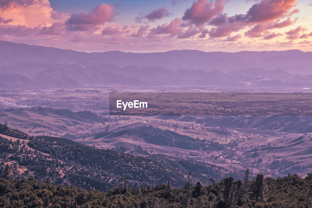 HIGH ANGLE VIEW OF LANDSCAPE AND MOUNTAINS AGAINST SKY