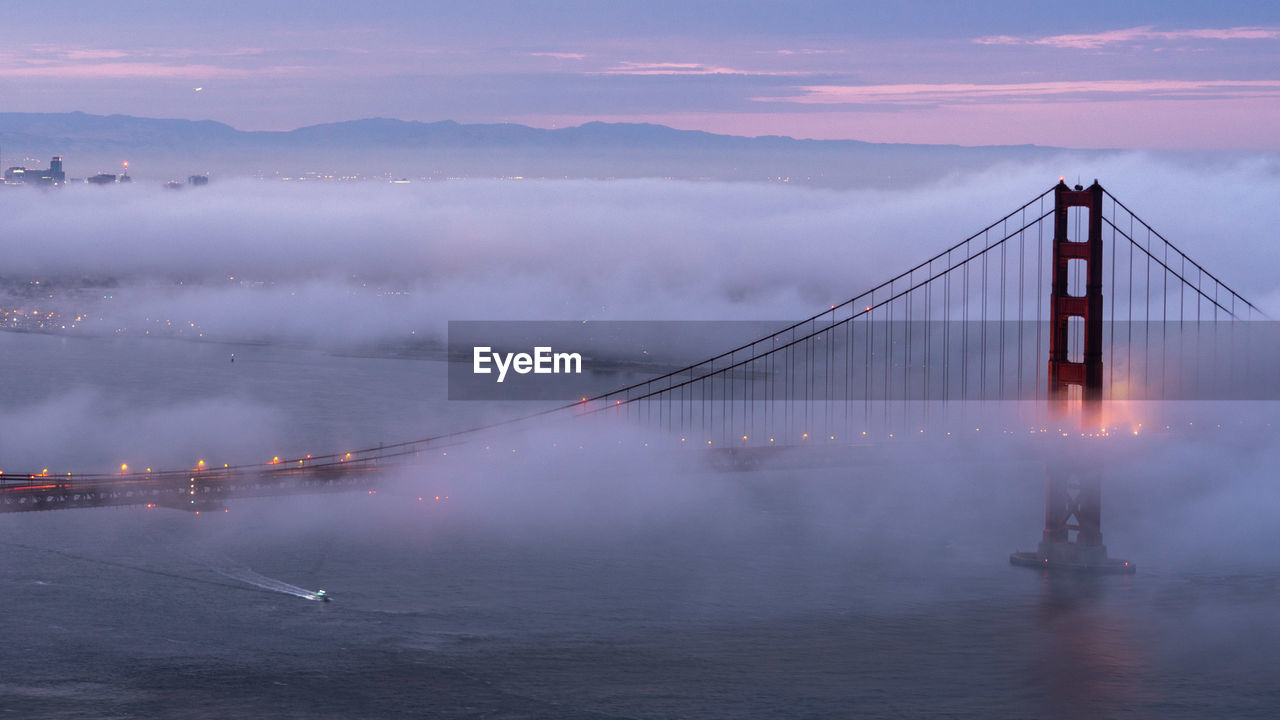 View of suspension bridge in city