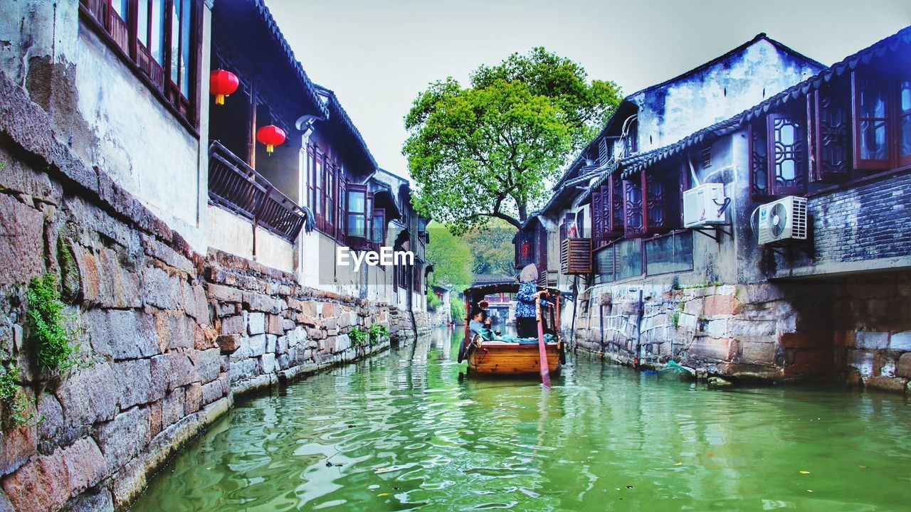 View of canal along buildings