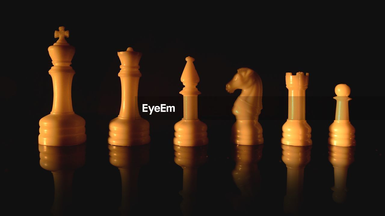 CLOSE-UP OF CHESS PIECES