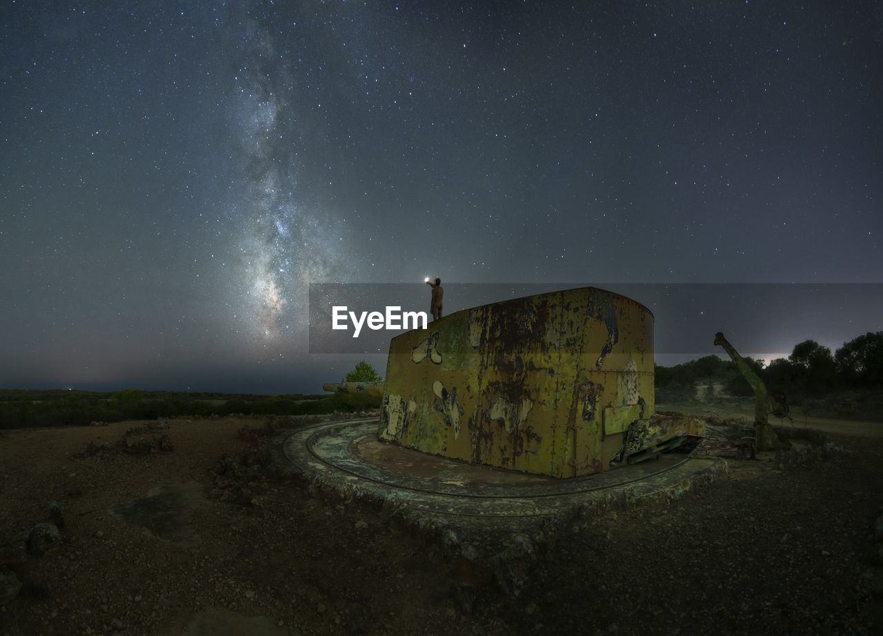 scenic view of landscape against sky at night