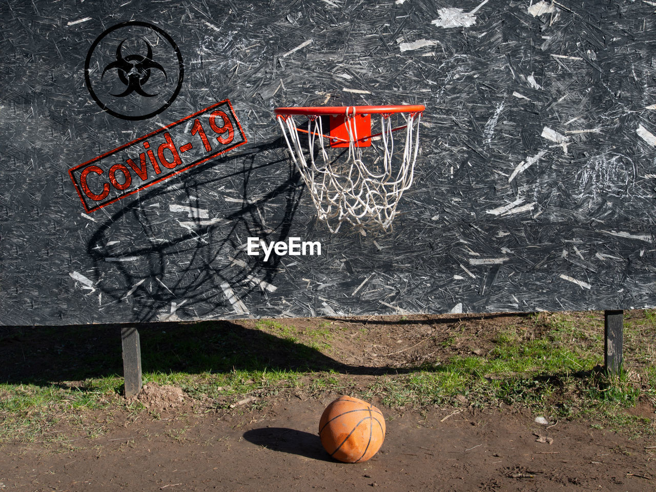 VIEW OF BASKETBALL HOOP AGAINST WALL